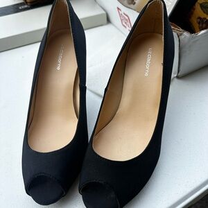 Sleek peep toe heels.